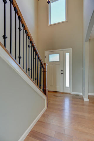 2003 Rylan Road Mahomet, IL 61853 - Photo 3 of 41 a view of a hallway with wooden floor and staircase