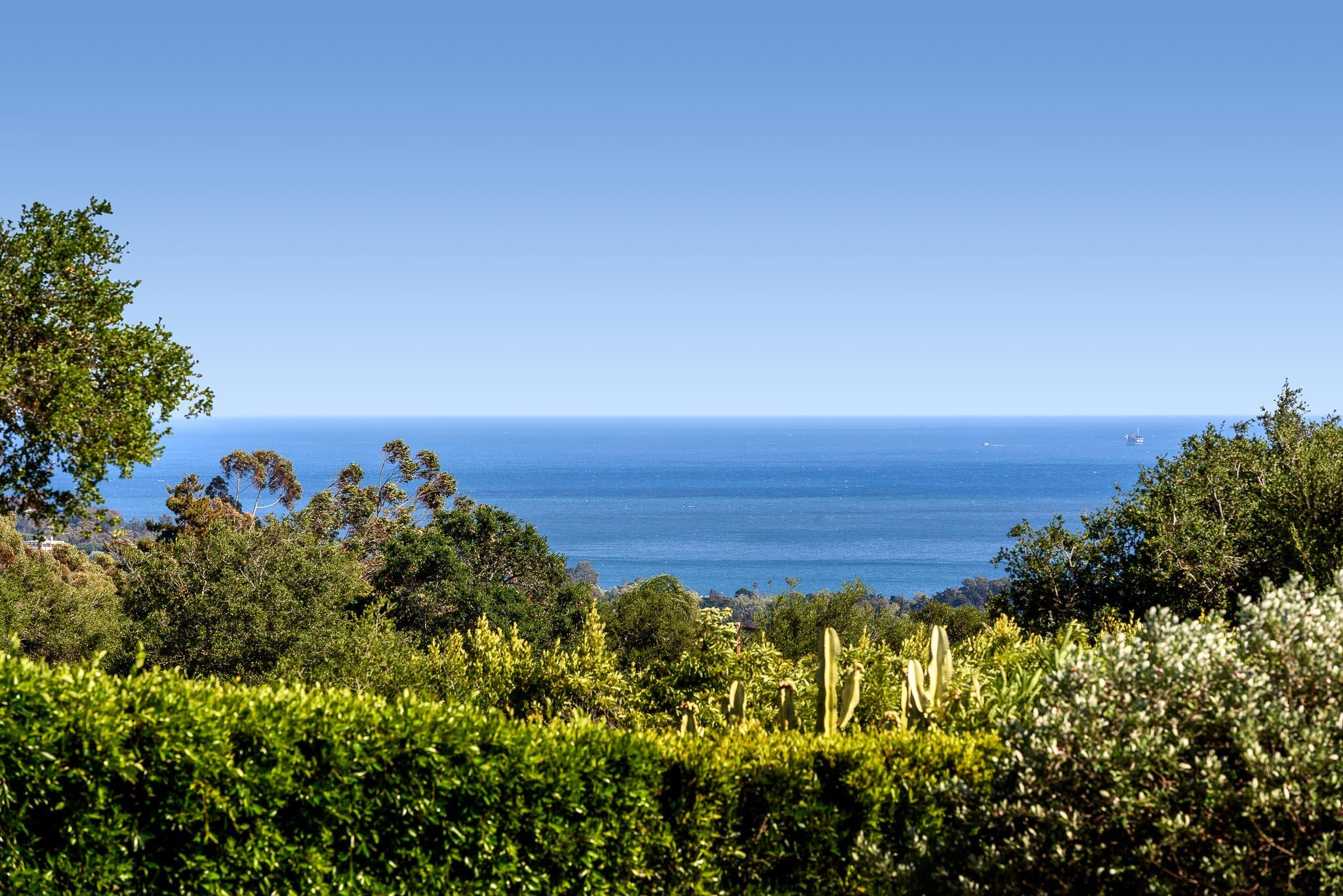 800 Hot Springs Road Montecito, CA 93108 - Photo 3 of 22 a view of a large body of water with lots of bushes