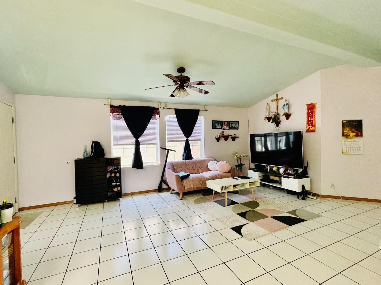 2600 Senter Road, Unit 261 San Jose, CA 95111 - Photo 2 of 12 a living room with furniture and wooden floor