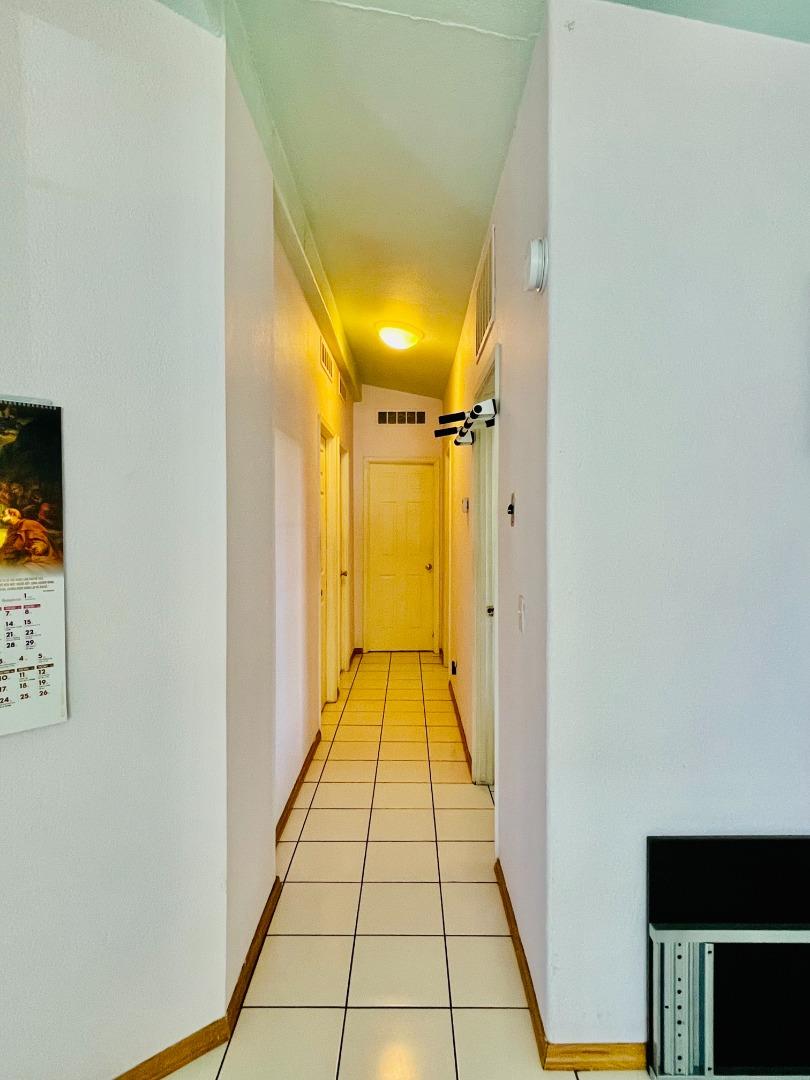 2600 Senter Road, Unit 261 San Jose, CA 95111 - Photo 5 of 12 a view of hallway with wooden floor