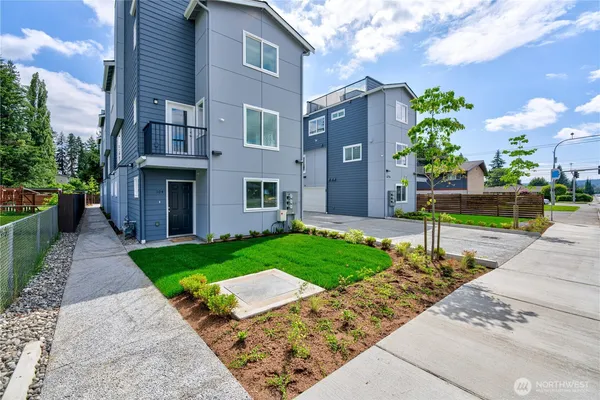 a view of a house with a street