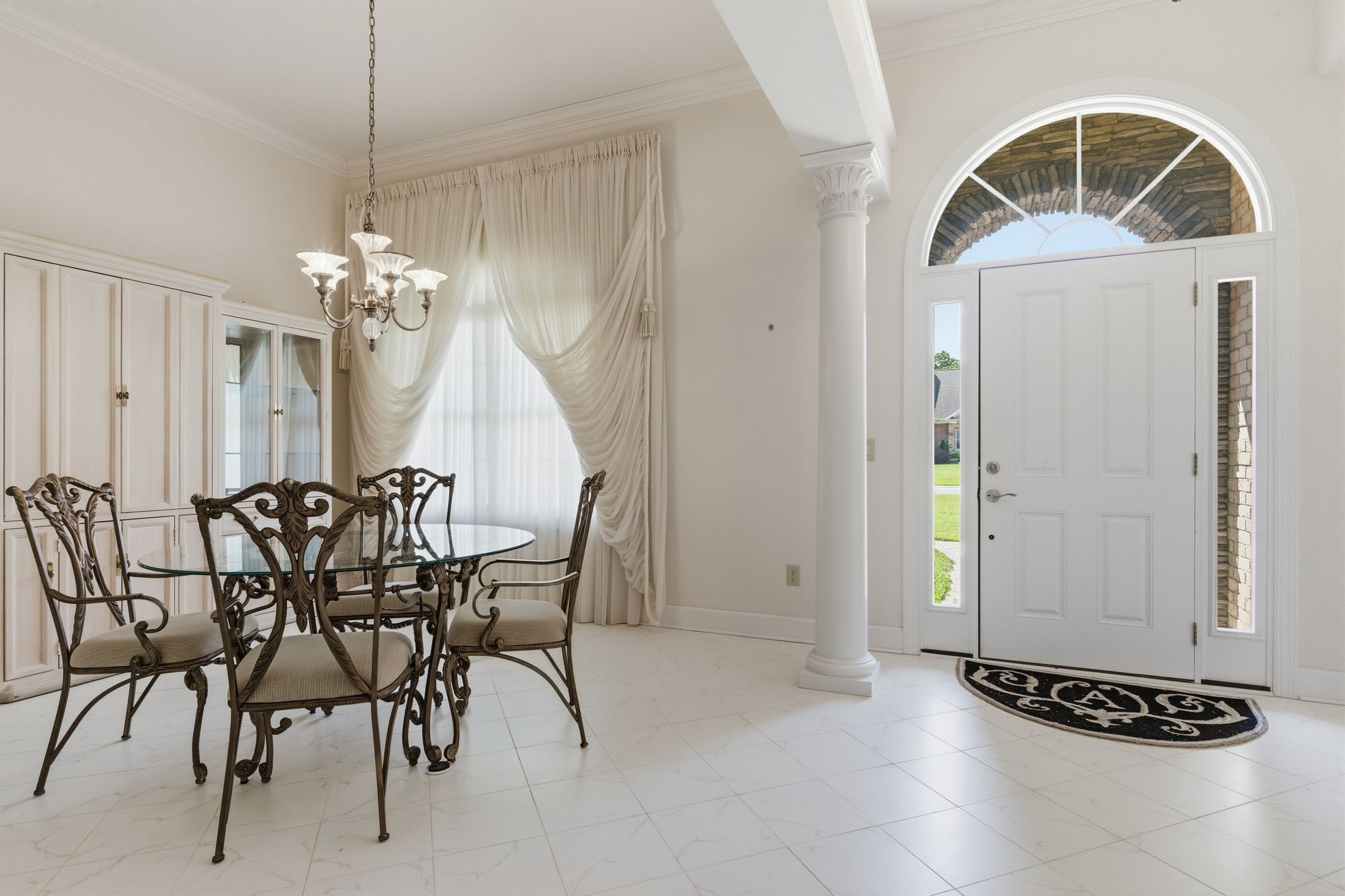 528 Country Club Drive Dickson, TN 37055 - Photo 8 of 55 a view of a dining room with furniture and chandelier