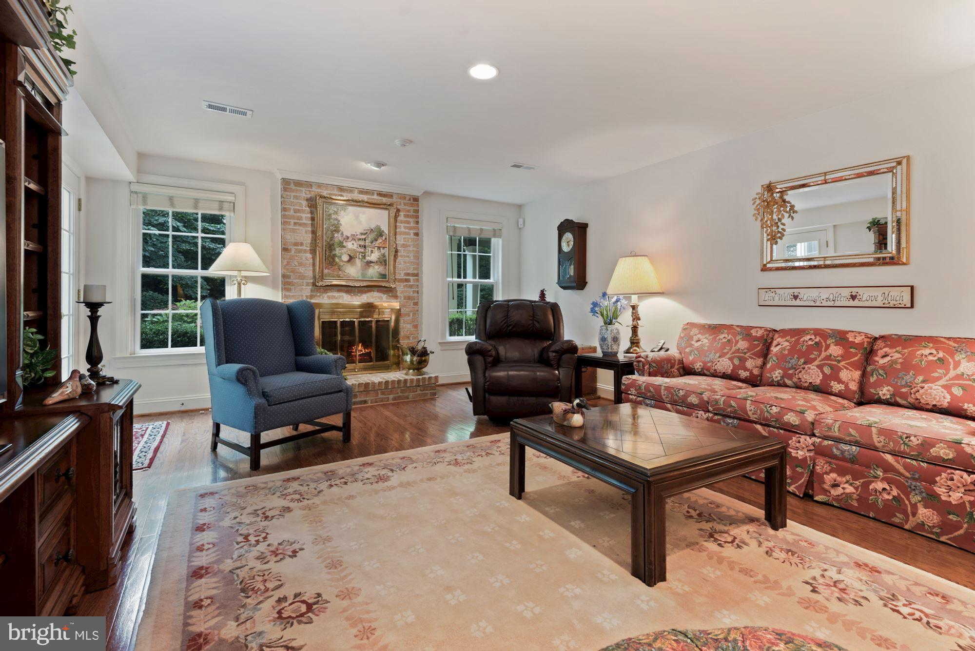 1138 Round Pebble Lane Reston, VA 20194 - Photo 27 of 55 Family Room w/fpl on L1--walk out to stone patio