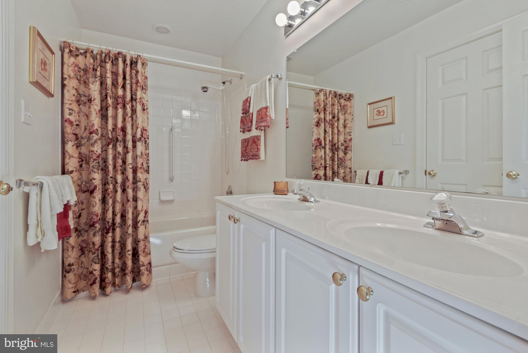1138 Round Pebble Lane Reston, VA 20194 - Photo 38 of 55 Hall Bath shared by BR2 & BR3