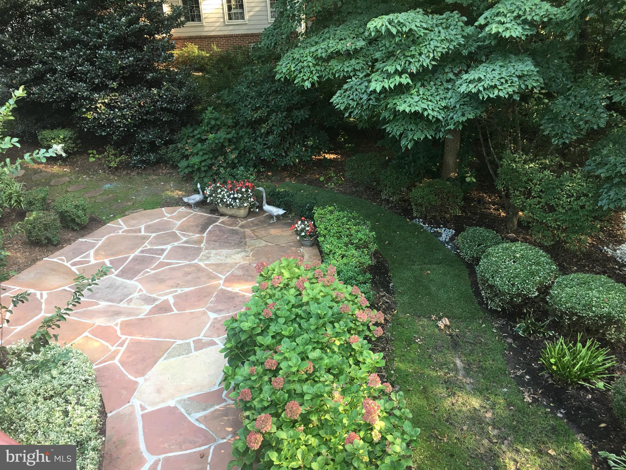1138 Round Pebble Lane Reston, VA 20194 - Photo 47 of 55 Stone patio and beautiful landscape