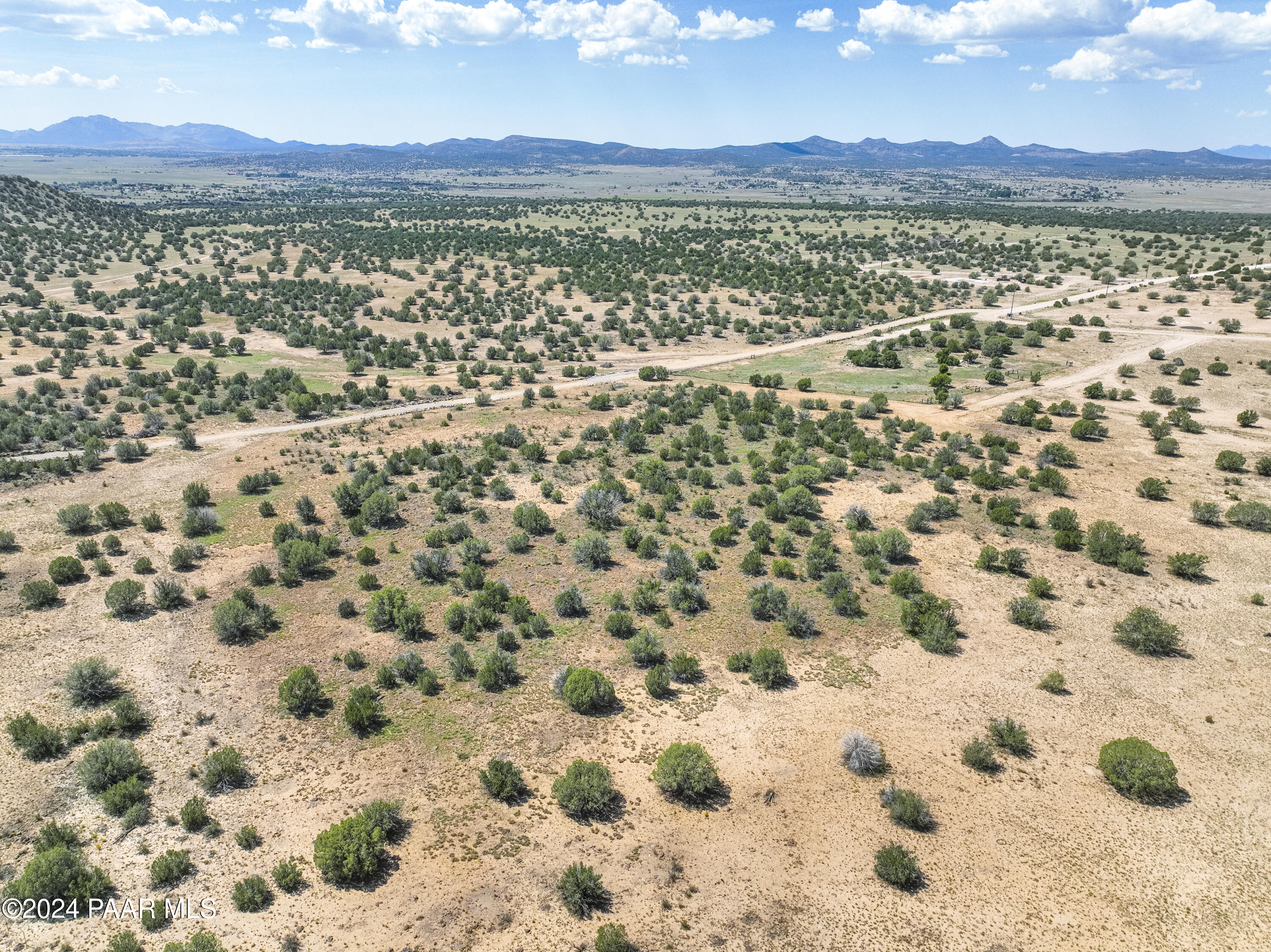 2 Acres Ranch Paulden, AZ 86334 - Photo 8 of 16 a view of a city with an ocean beach
