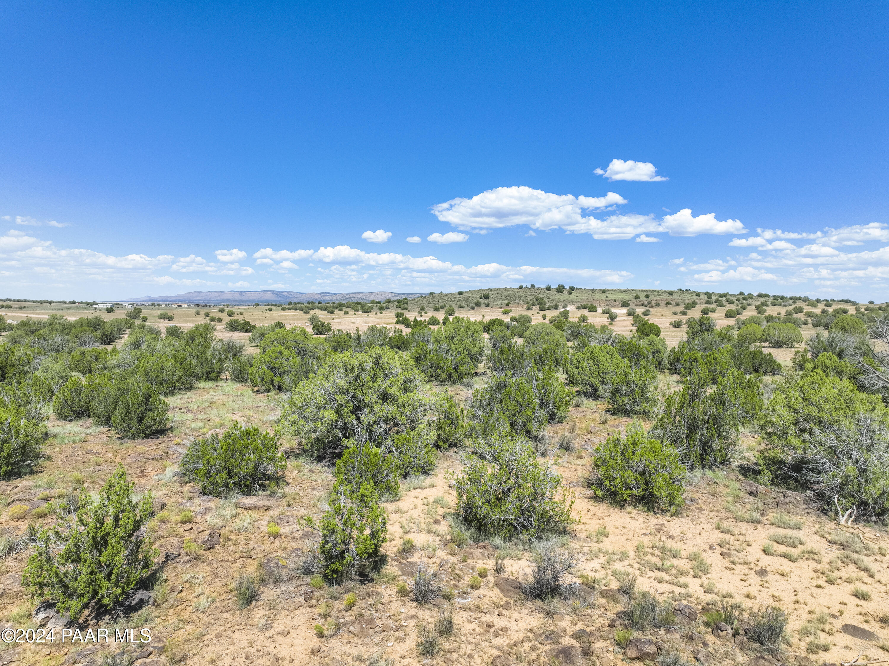 2 Acres Ranch Paulden, AZ 86334 - Photo 9 of 16 a view of a lake with a mountain