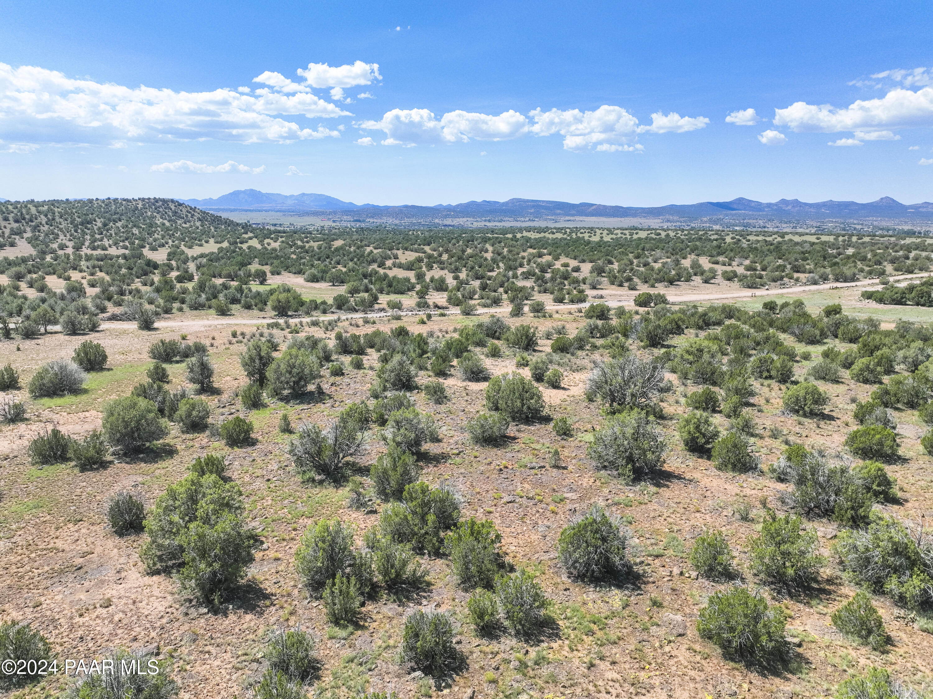 2 Acres Ranch Paulden, AZ 86334 - Photo 10 of 16 a view of a city with mountain in the background
