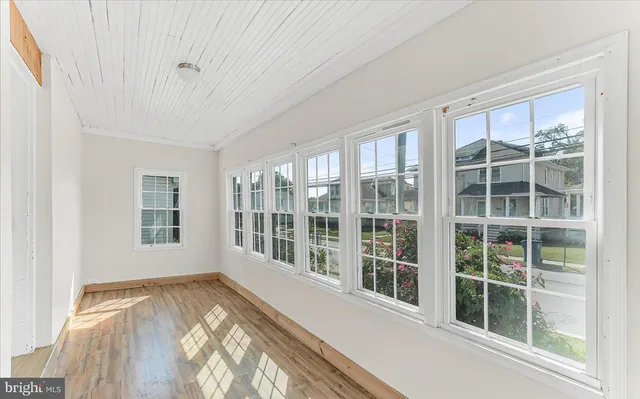 a view of a room with a large window