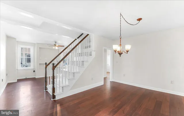 a view of entryway with wooden floor