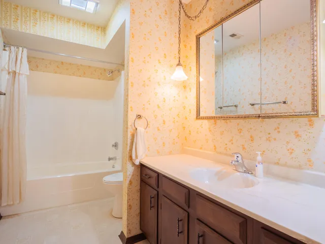 a bathroom with a sink and a bathtub