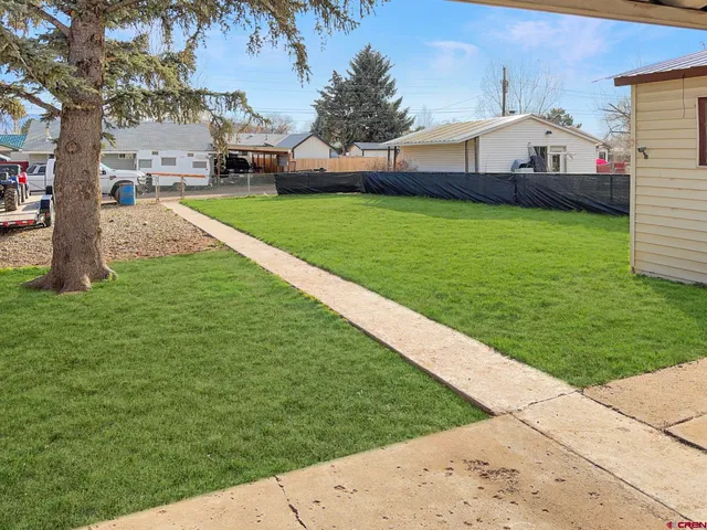 a view of a backyard with a garden