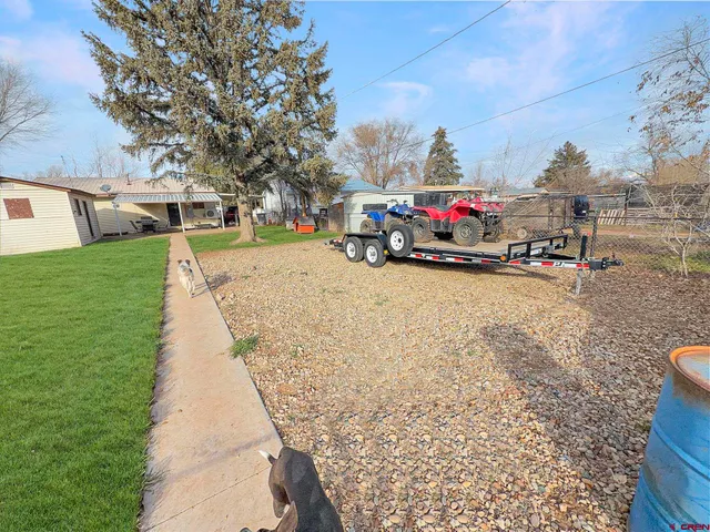 a view of a park with swings and slides