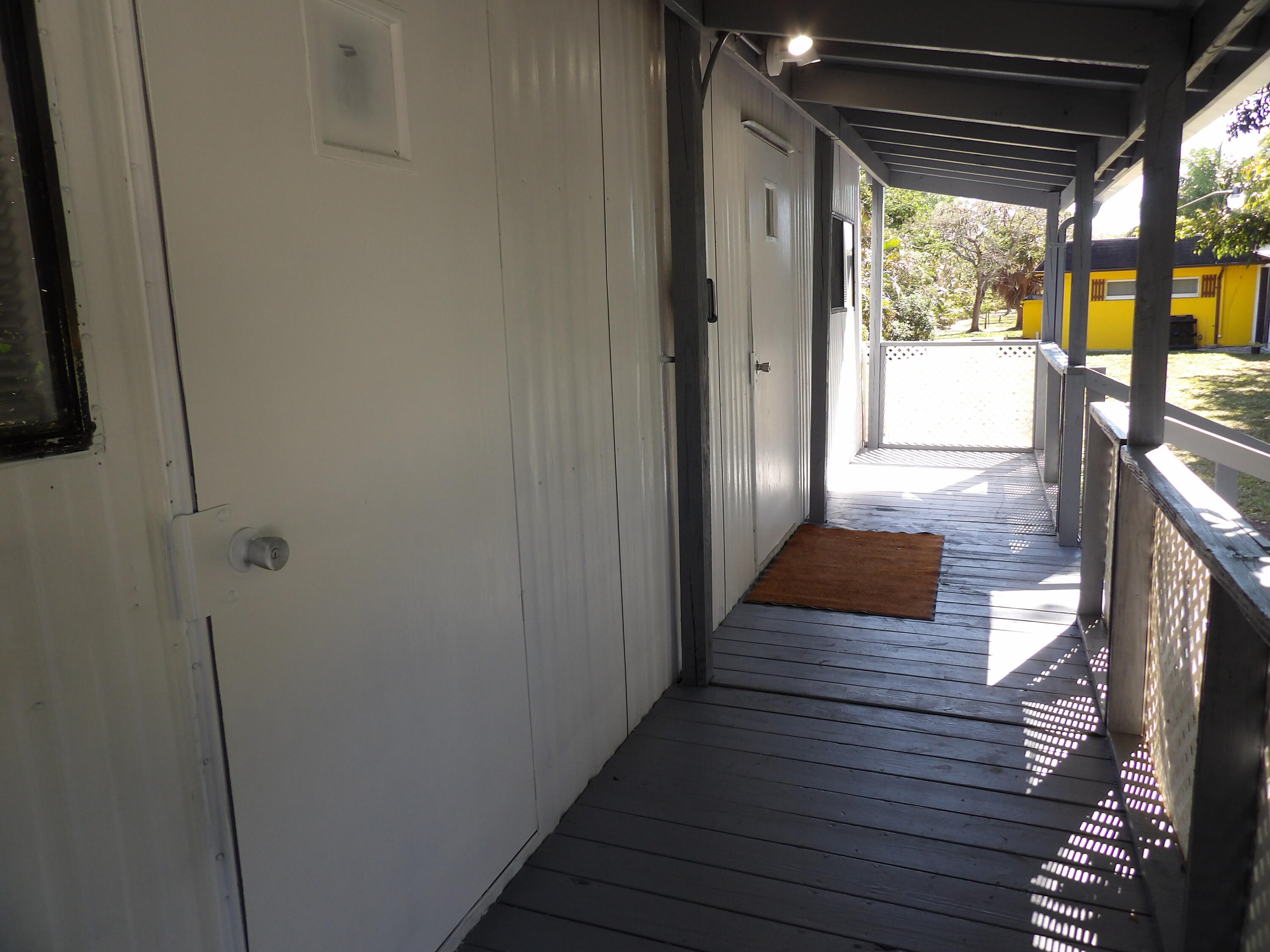 6287 Gun Club Road West Palm Beach, FL 33415 - Photo 7 of 9 Covered Porch