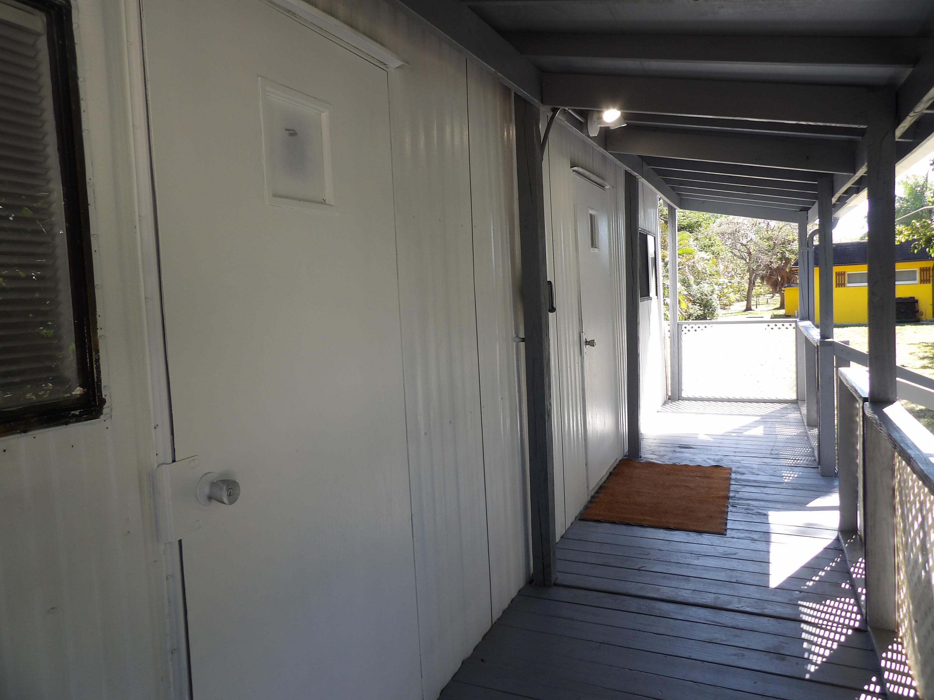 6287 Gun Club Road West Palm Beach, FL 33415 - Photo 8 of 9 Covered Porch