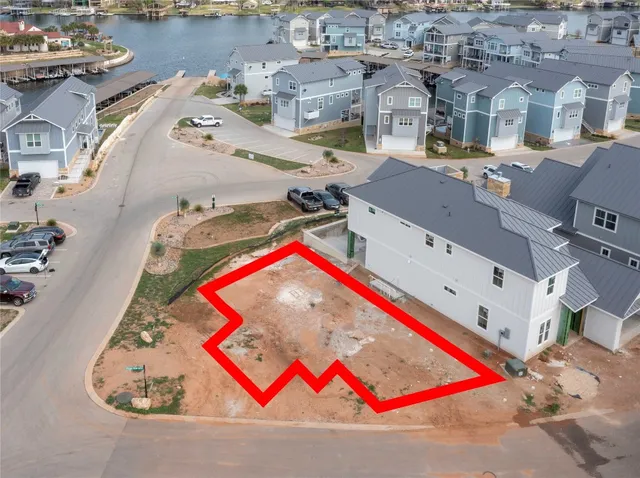 an aerial view of a pool patio and outdoor seating