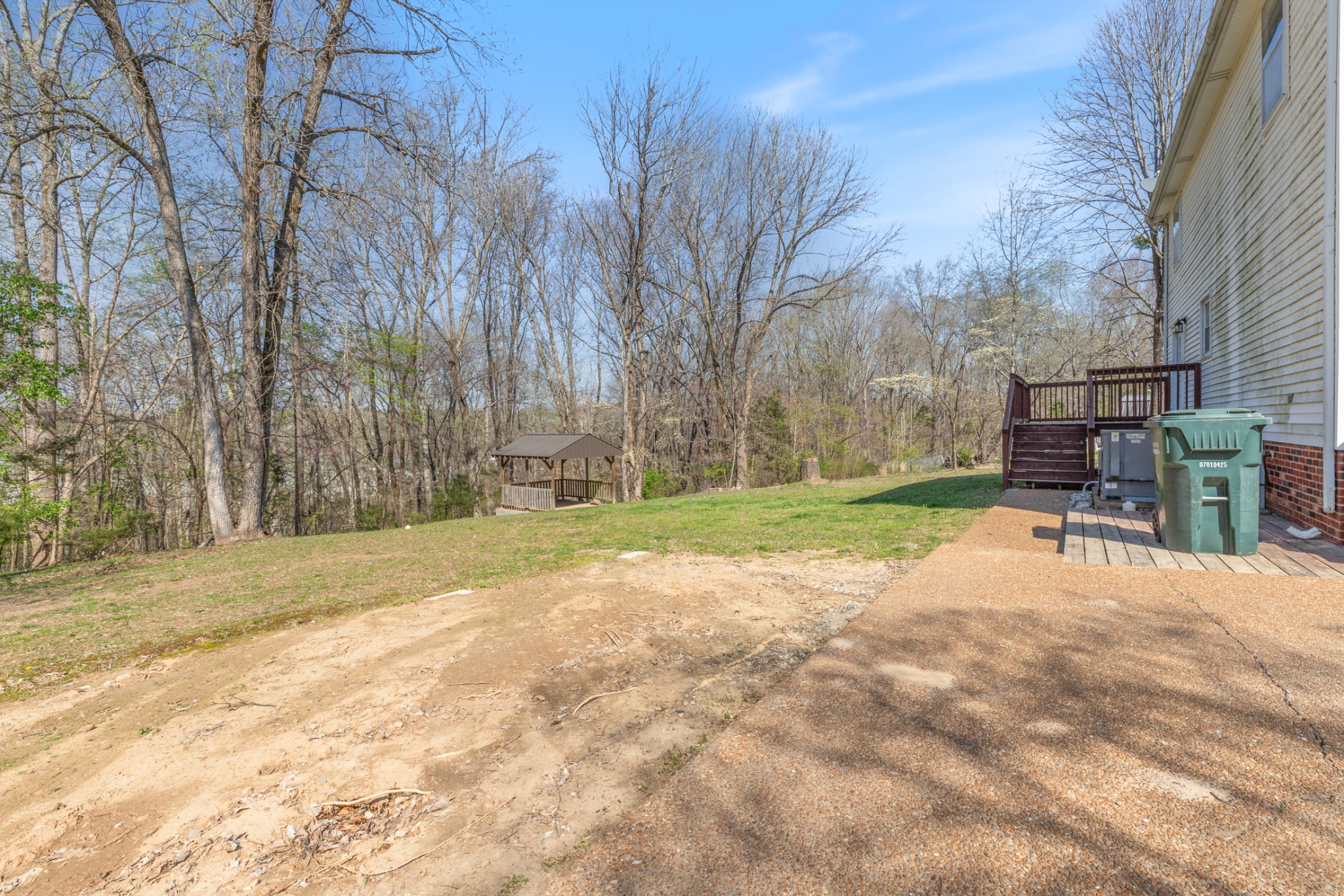 110 Redbud Drive Dickson, TN 37055 - Photo 11 of 43 a view of backyard with outdoor seating and trees