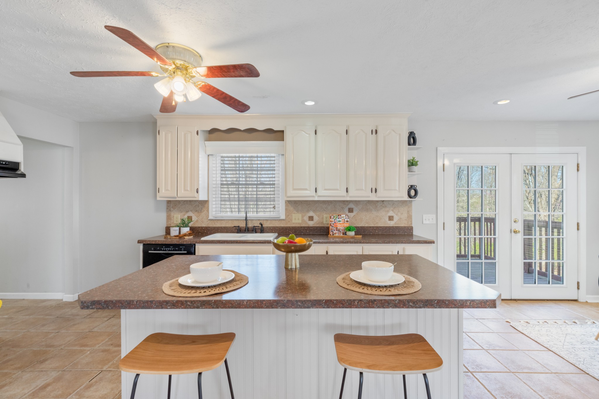 110 Redbud Drive Dickson, TN 37055 - Photo 19 of 43 a kitchen with a dining table and chairs