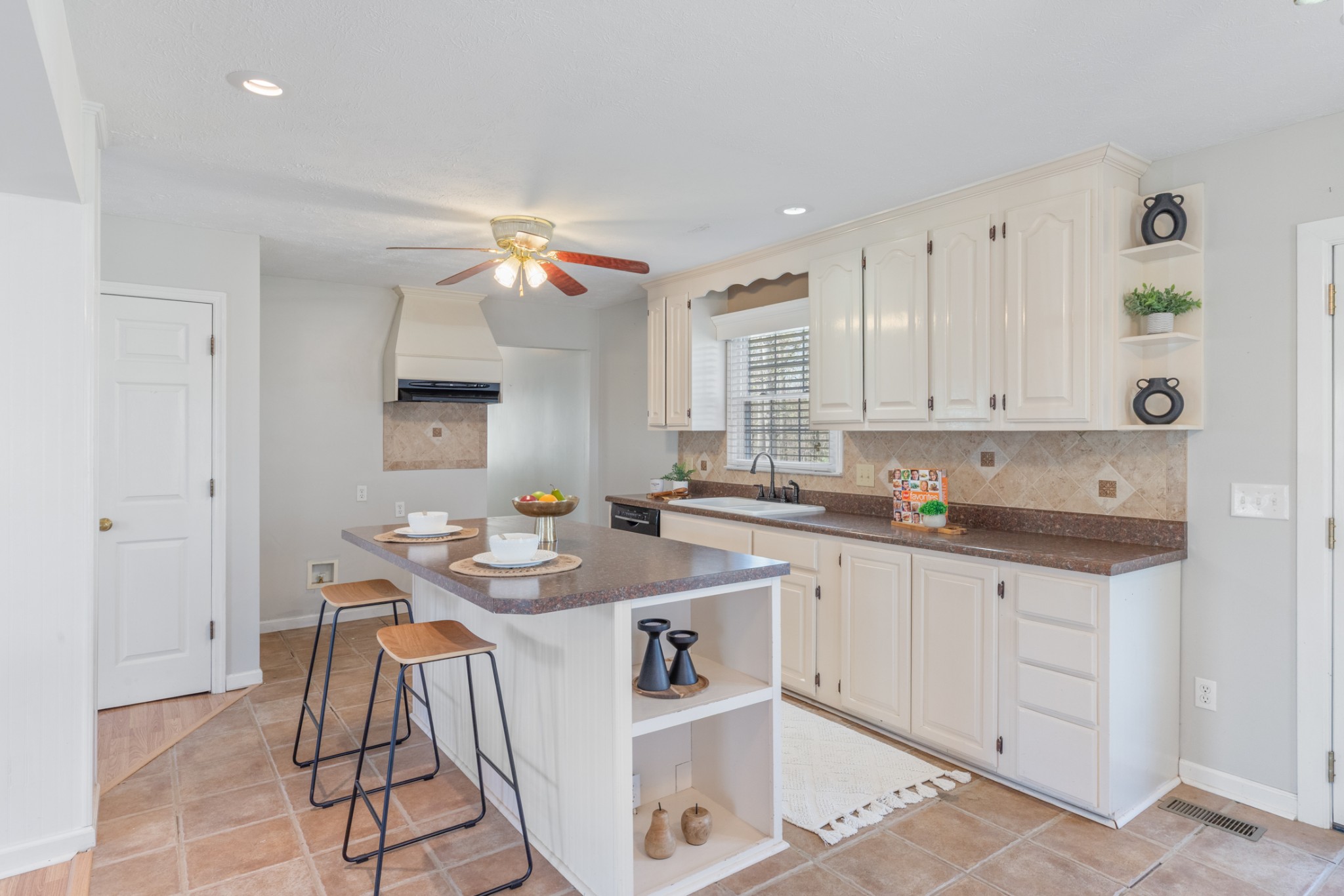 110 Redbud Drive Dickson, TN 37055 - Photo 20 of 43 a kitchen with stainless steel appliances granite countertop a sink stove and cabinets
