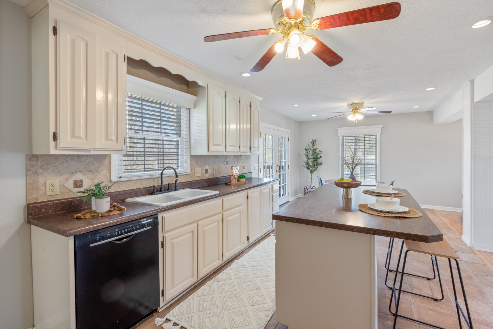 110 Redbud Drive Dickson, TN 37055 - Photo 21 of 43 a kitchen with a sink stove and cabinets