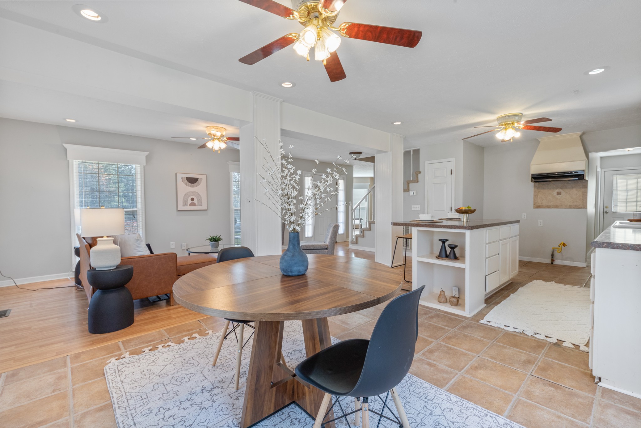 110 Redbud Drive Dickson, TN 37055 - Photo 23 of 43 a living room with dining table and a dining table with kitchen view