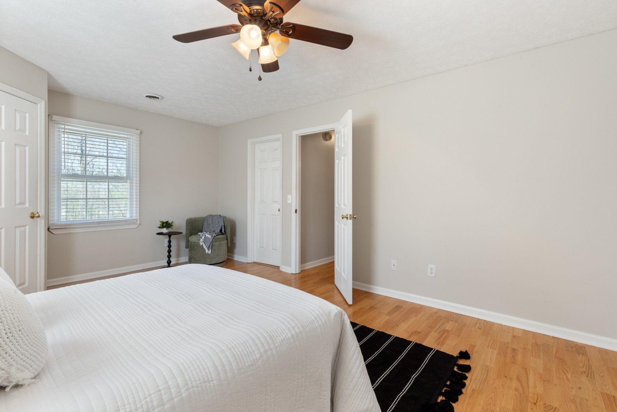 110 Redbud Drive Dickson, TN 37055 - Photo 28 of 43 a bedroom with a bed and a window