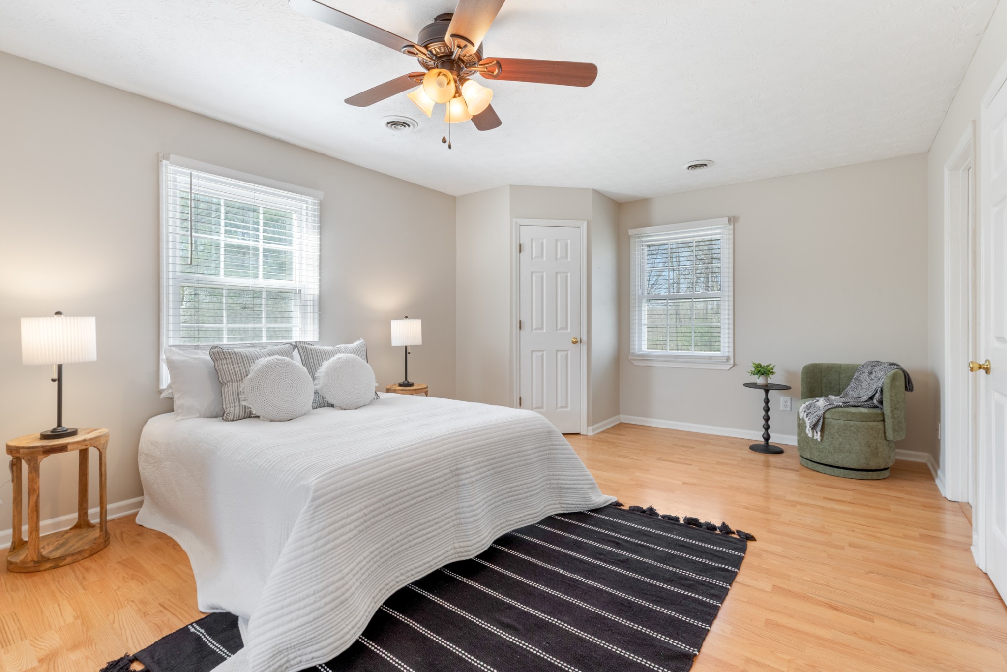110 Redbud Drive Dickson, TN 37055 - Photo 29 of 43 a bedroom with a bed and a chandelier