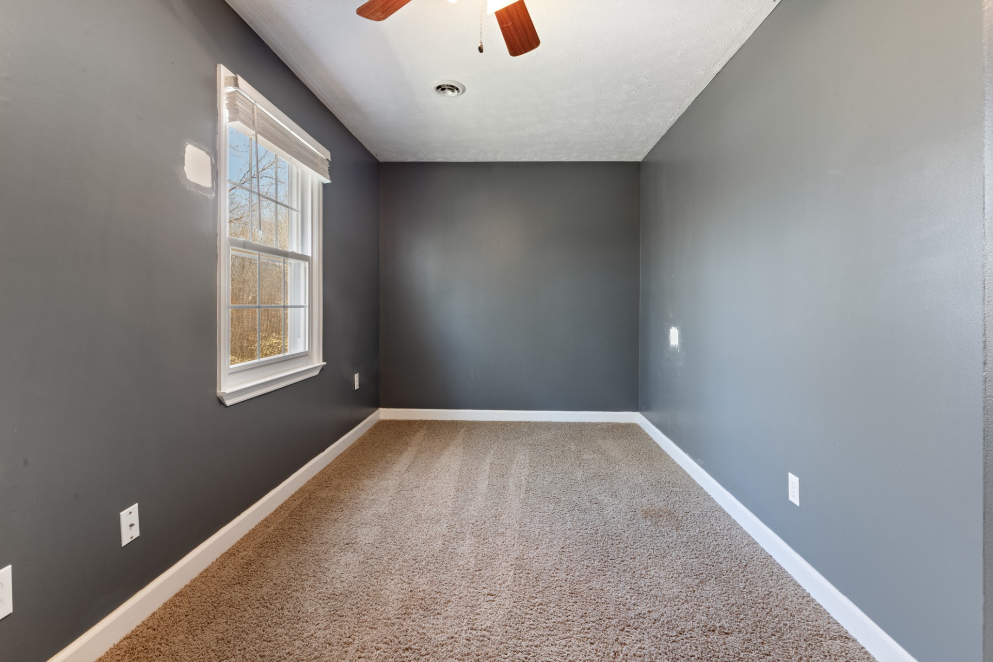 110 Redbud Drive Dickson, TN 37055 - Photo 33 of 43 a view of an empty room with a window