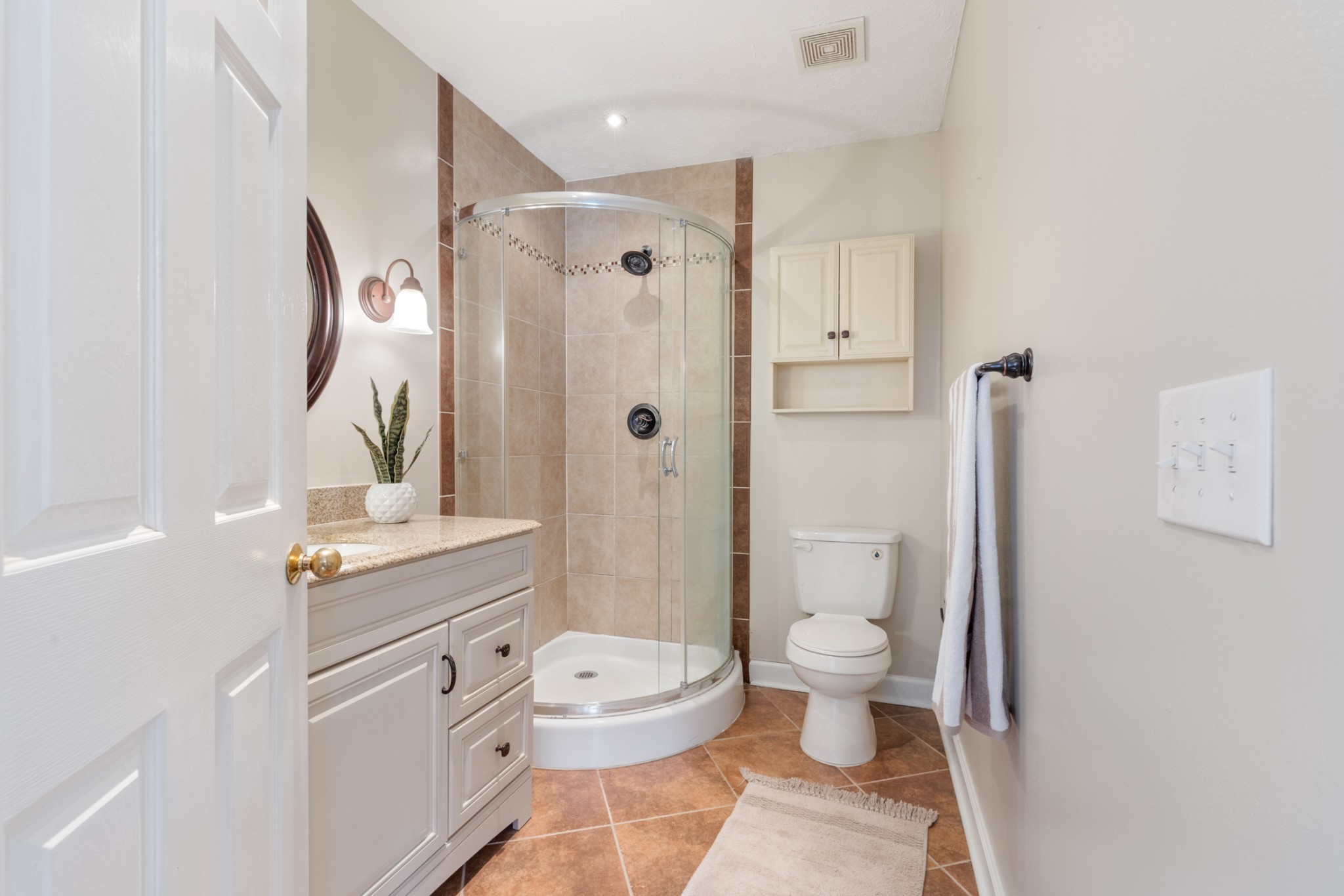110 Redbud Drive Dickson, TN 37055 - Photo 37 of 43 a bathroom with a sink a toilet and shower