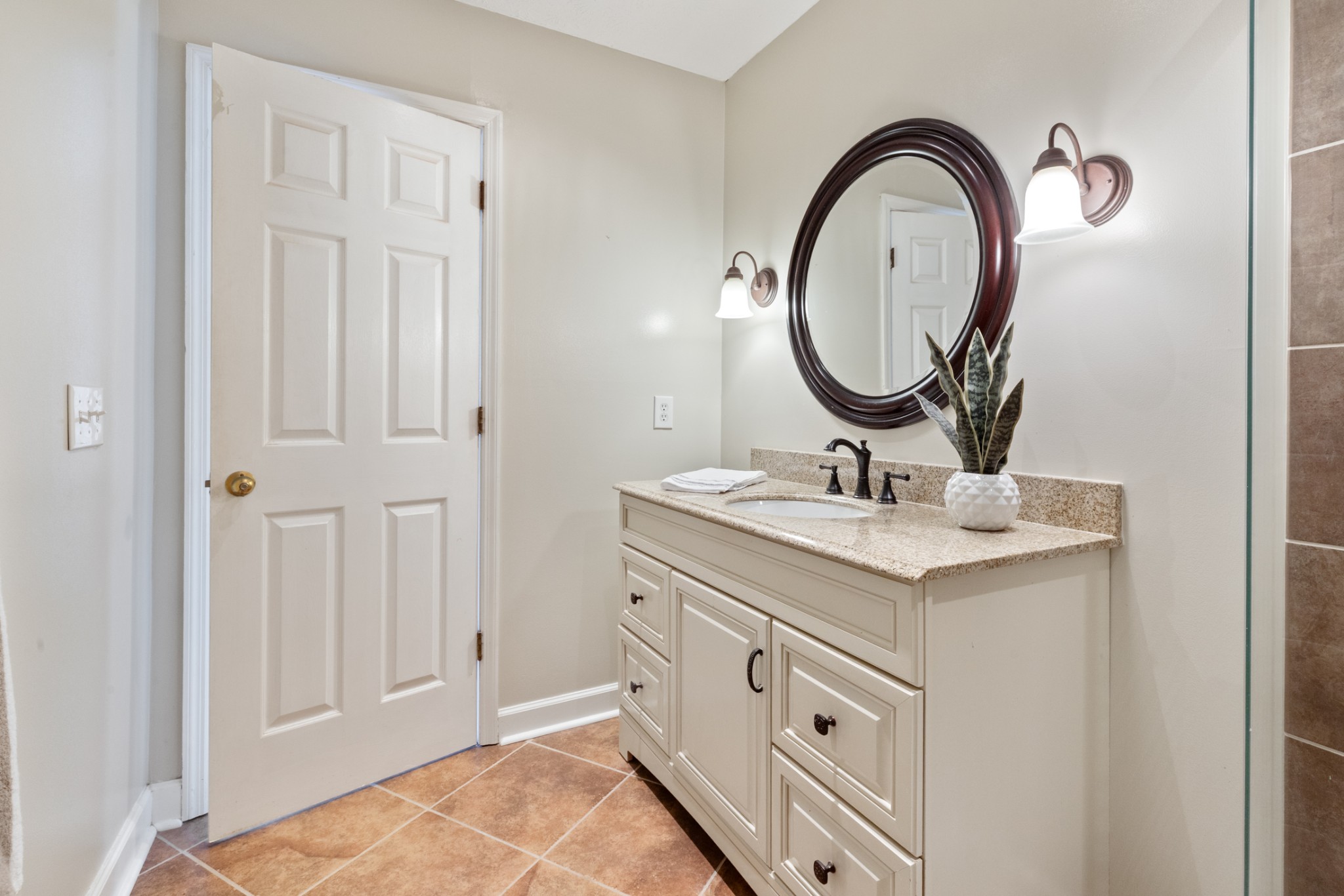 110 Redbud Drive Dickson, TN 37055 - Photo 38 of 43 a bathroom with a granite countertop sink a mirror and a