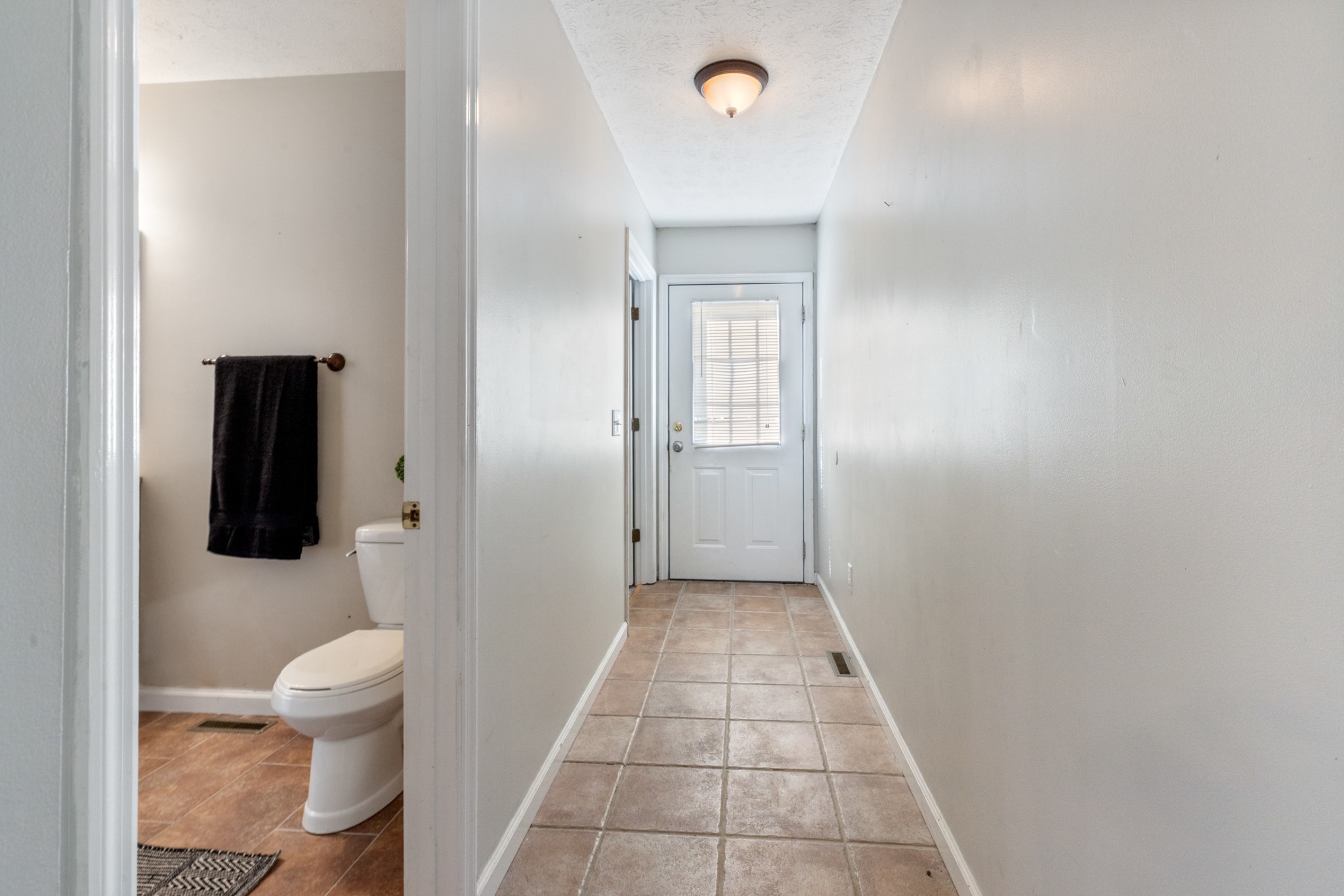 110 Redbud Drive Dickson, TN 37055 - Photo 40 of 43 a bathroom with a toilet and a sink