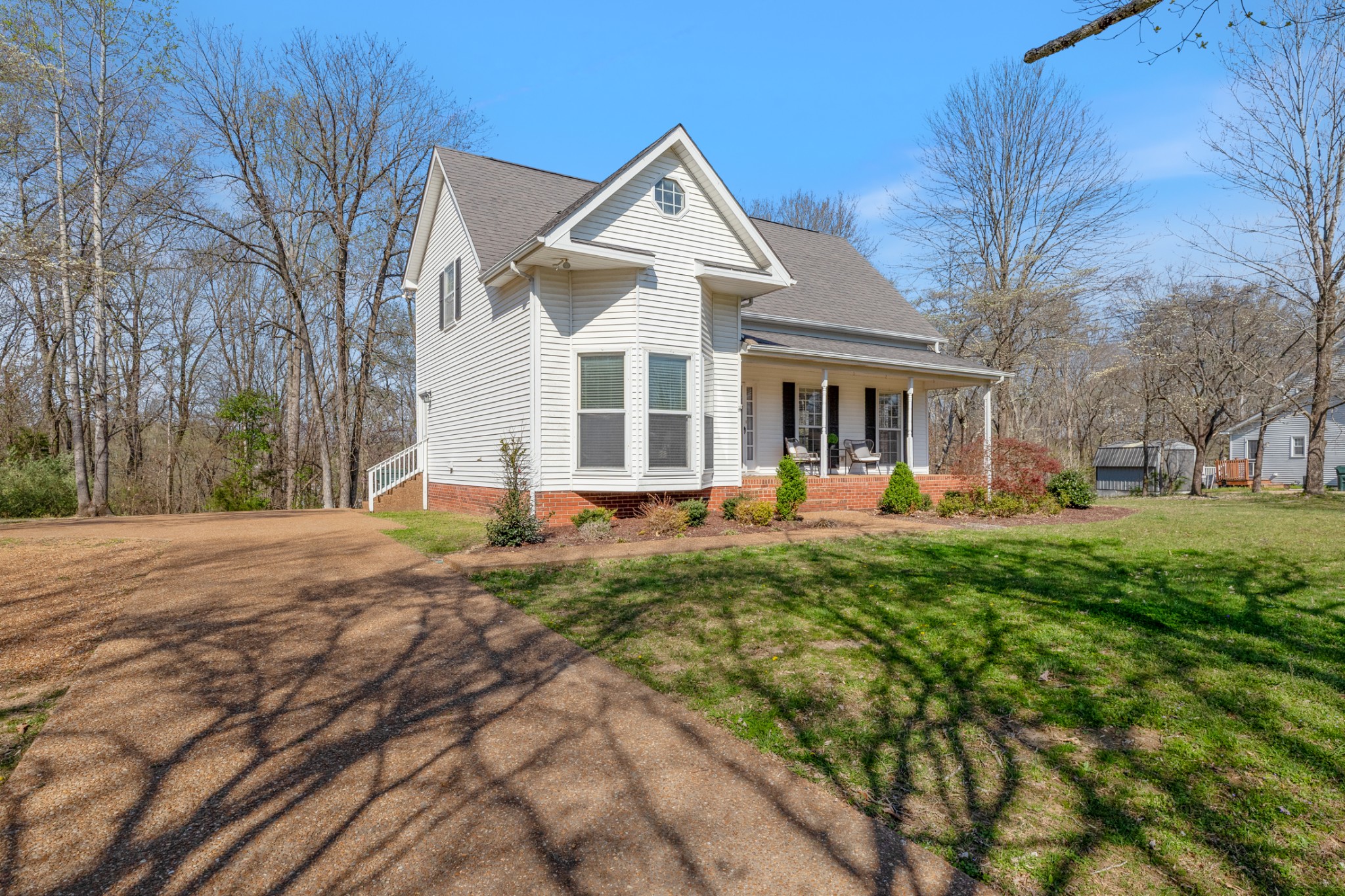 110 Redbud Drive Dickson, TN 37055 - Photo 4 of 43 a front view of a house with a yard