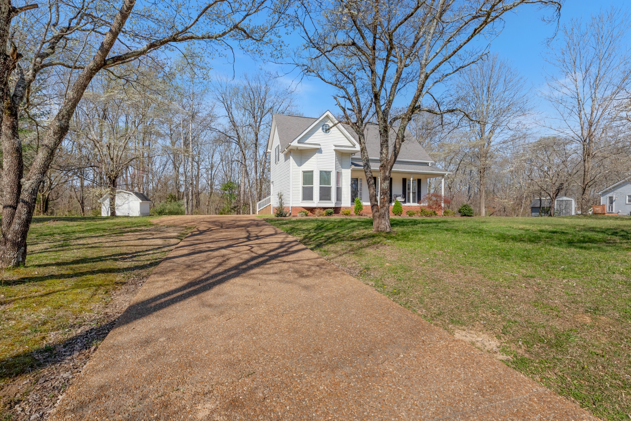 110 Redbud Drive Dickson, TN 37055 - Photo 43 of 43 a front view of a house with a yard