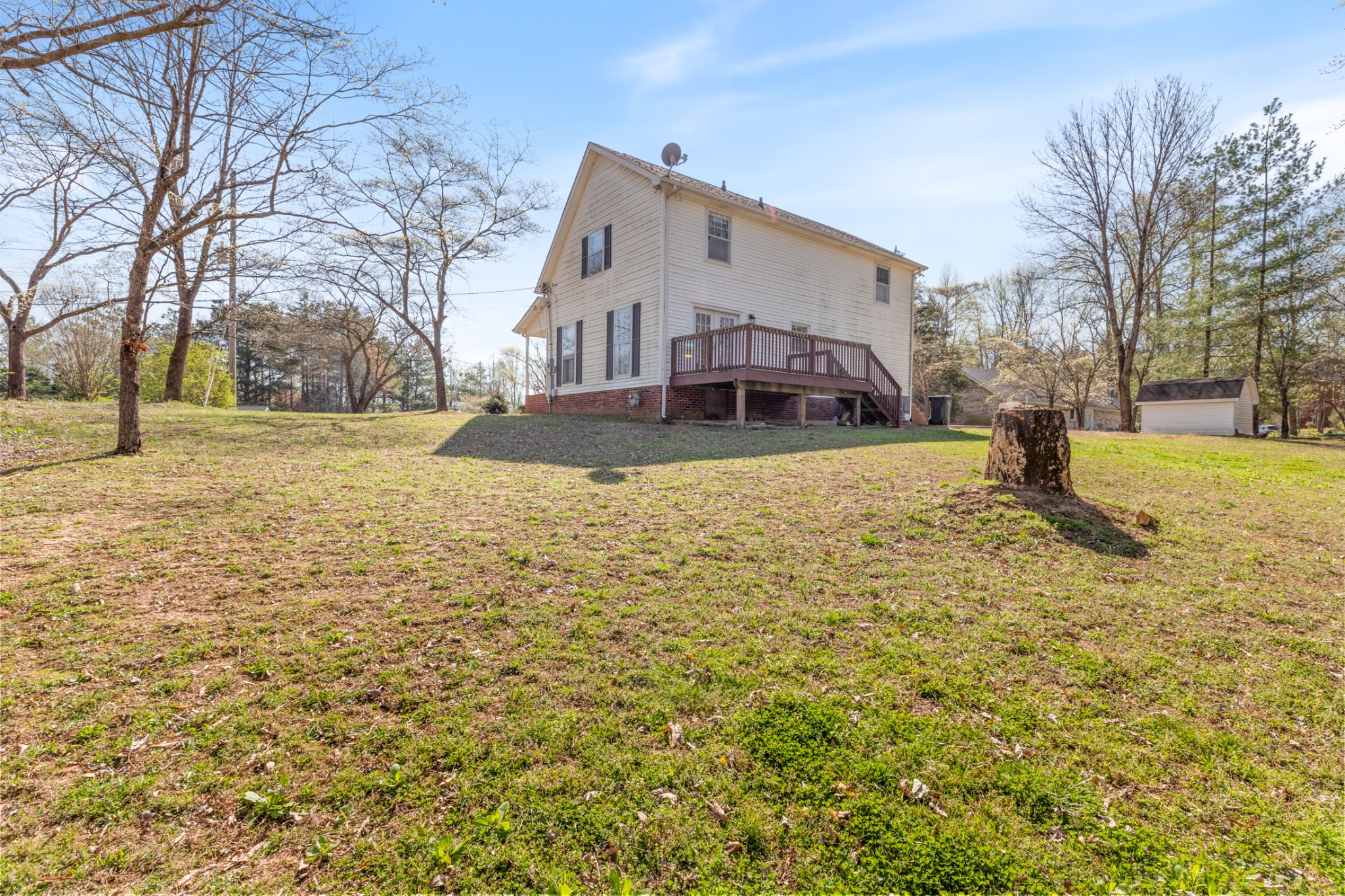 110 Redbud Drive Dickson, TN 37055 - Photo 7 of 43 a view of a yard with a house