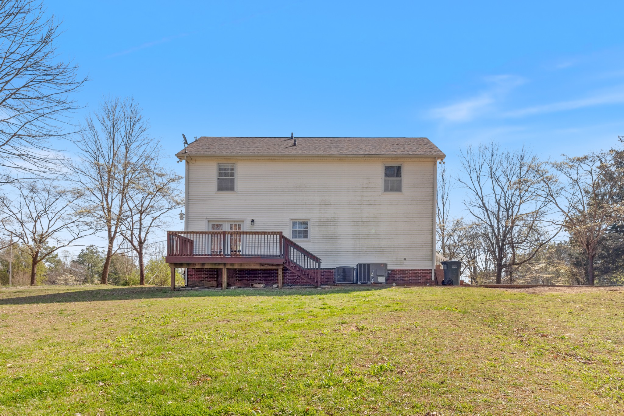 110 Redbud Drive Dickson, TN 37055 - Photo 9 of 43 a view of a house with a yard and sitting area
