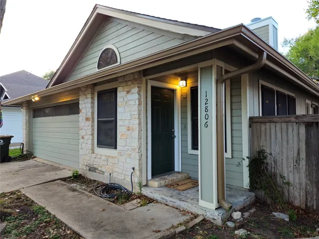 a view of a house with a small porch