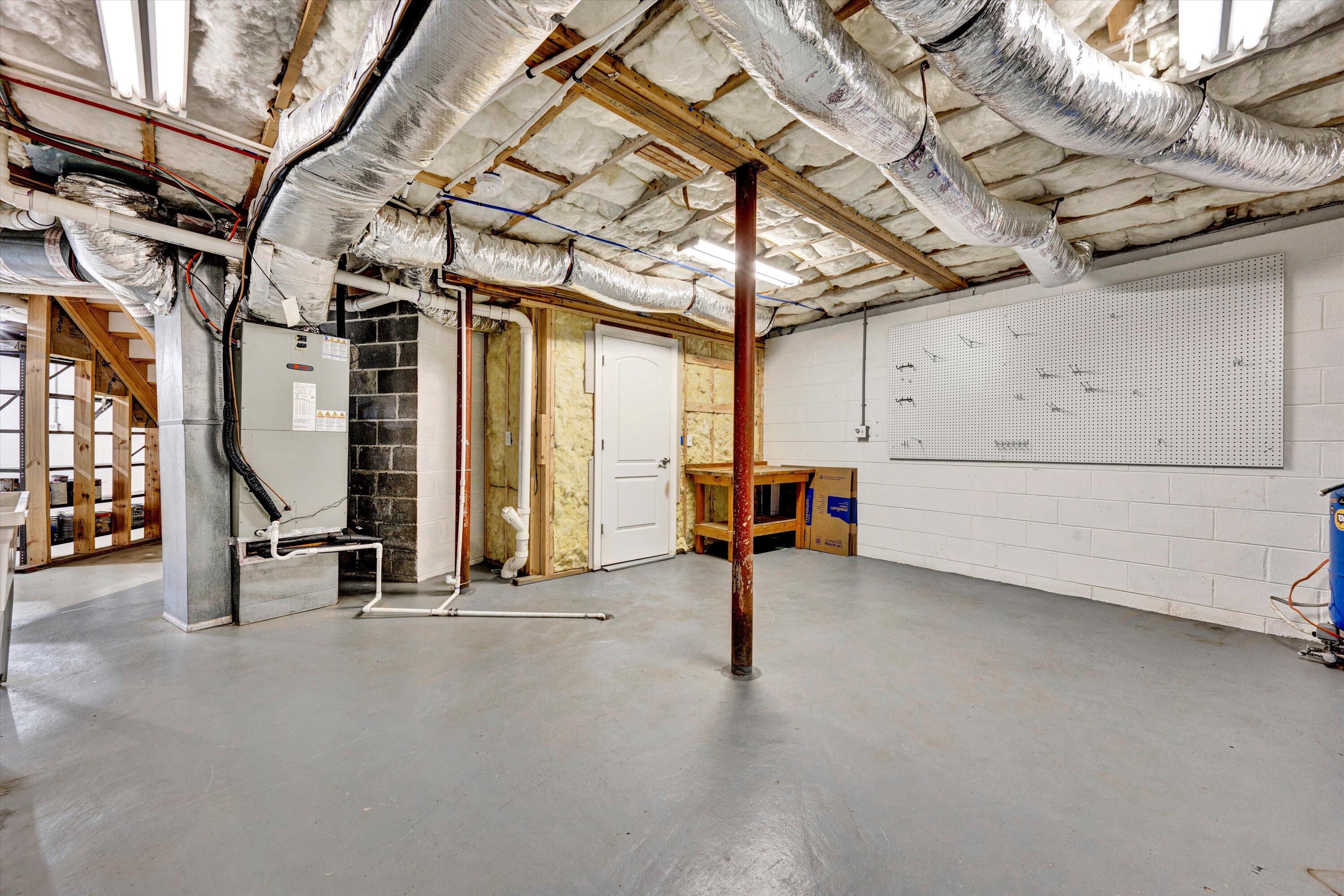 571 Cary Road Pilot, VA 24138 - Photo 54 of 89 a view of a room with racks on the wall