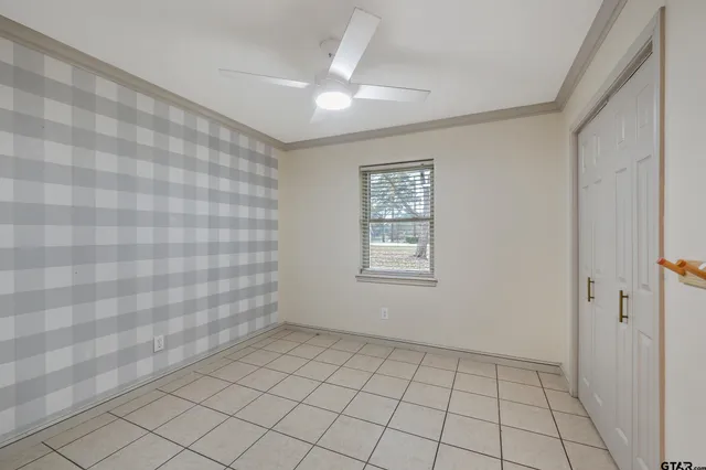 a view of an empty room and window