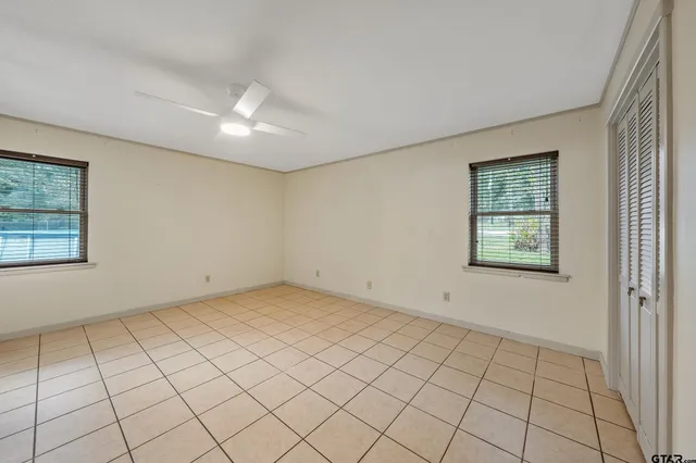 an empty room with windows