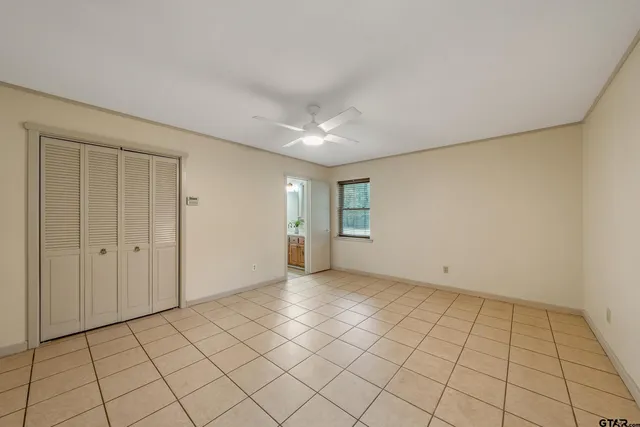 a view of an empty room and window
