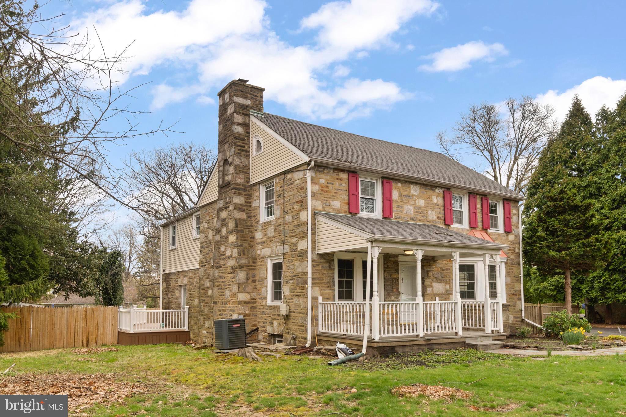 163 Welsh Road Huntingdon Valley, PA 19006 - Photo 4 of 27 a front view of a house with a yard