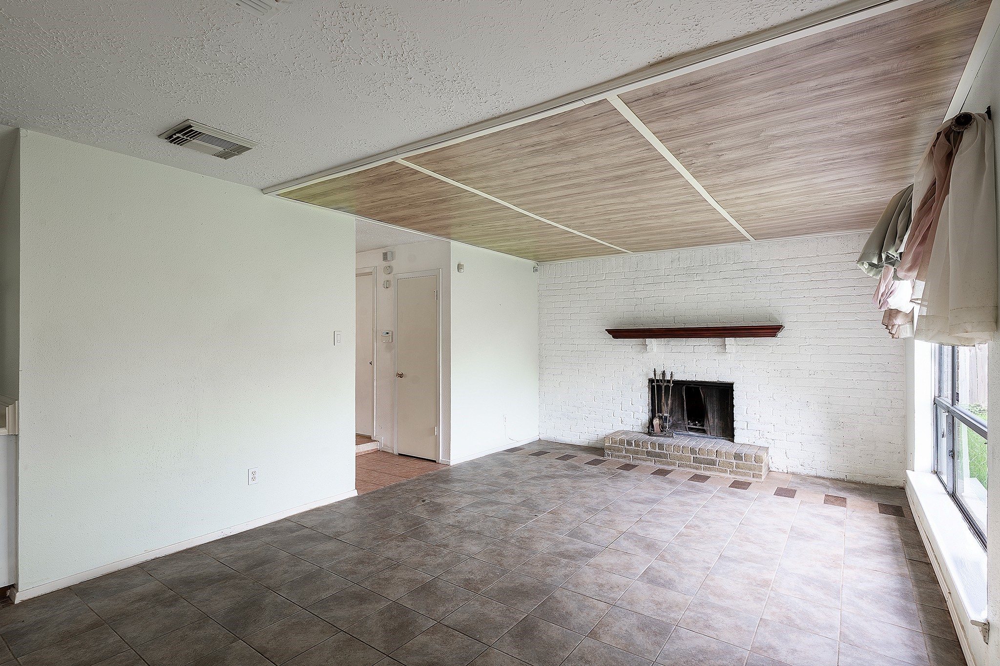 4423 Mossygate Drive Spring, TX 77373 - Photo 17 of 38 a view of empty room with front door