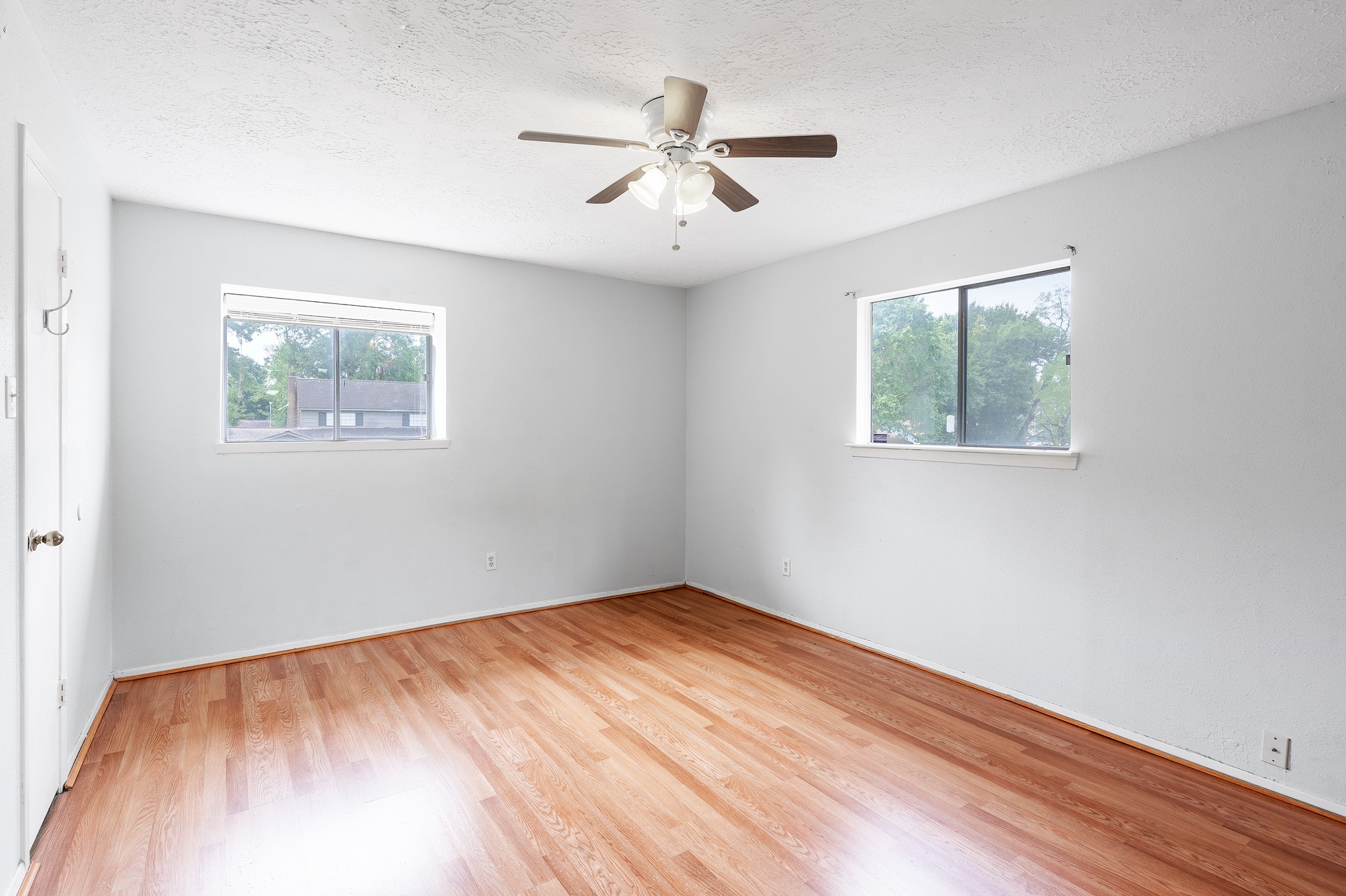 4423 Mossygate Drive Spring, TX 77373 - Photo 27 of 38 a view of empty room with wooden floor and fan