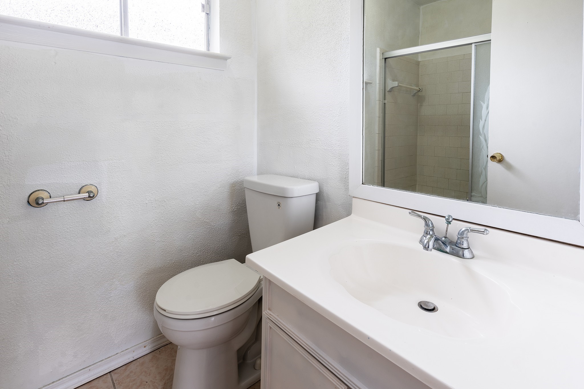 4423 Mossygate Drive Spring, TX 77373 - Photo 28 of 38 a bathroom with a sink a toilet and shower