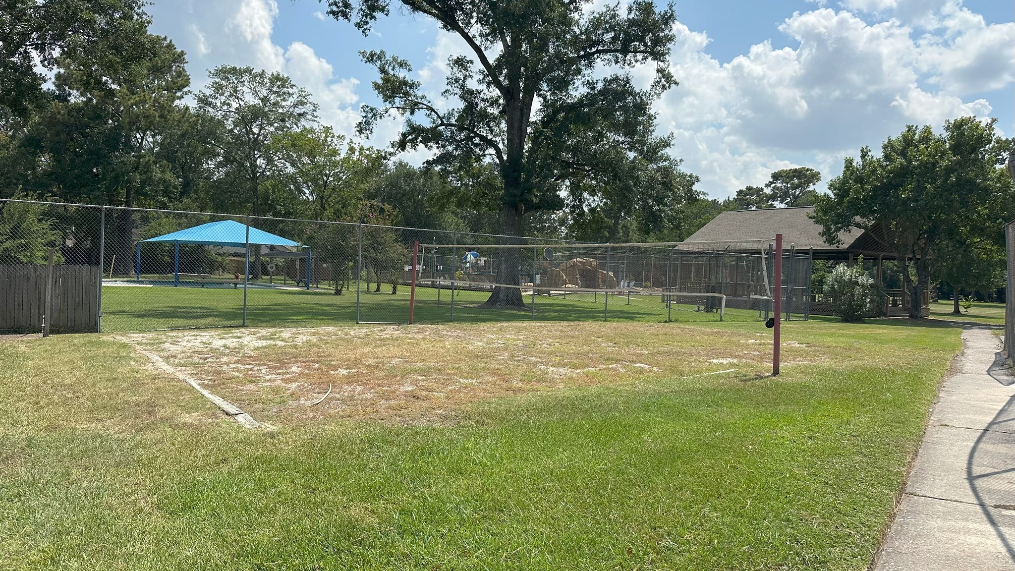 4423 Mossygate Drive Spring, TX 77373 - Photo 34 of 38 a swimming pool with outdoor seating and yard