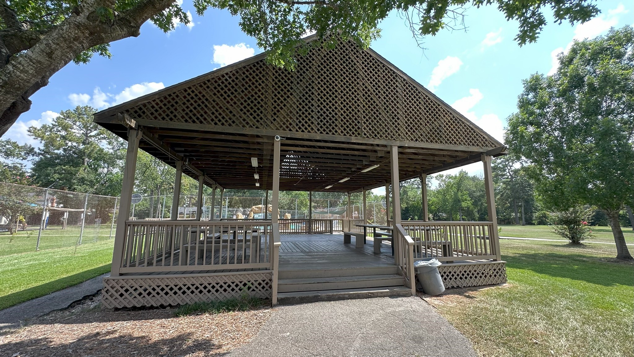 4423 Mossygate Drive Spring, TX 77373 - Photo 35 of 38 a view of a roof deck with chair and wooden fence
