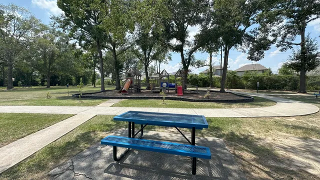 a swimming pool with wooden fence