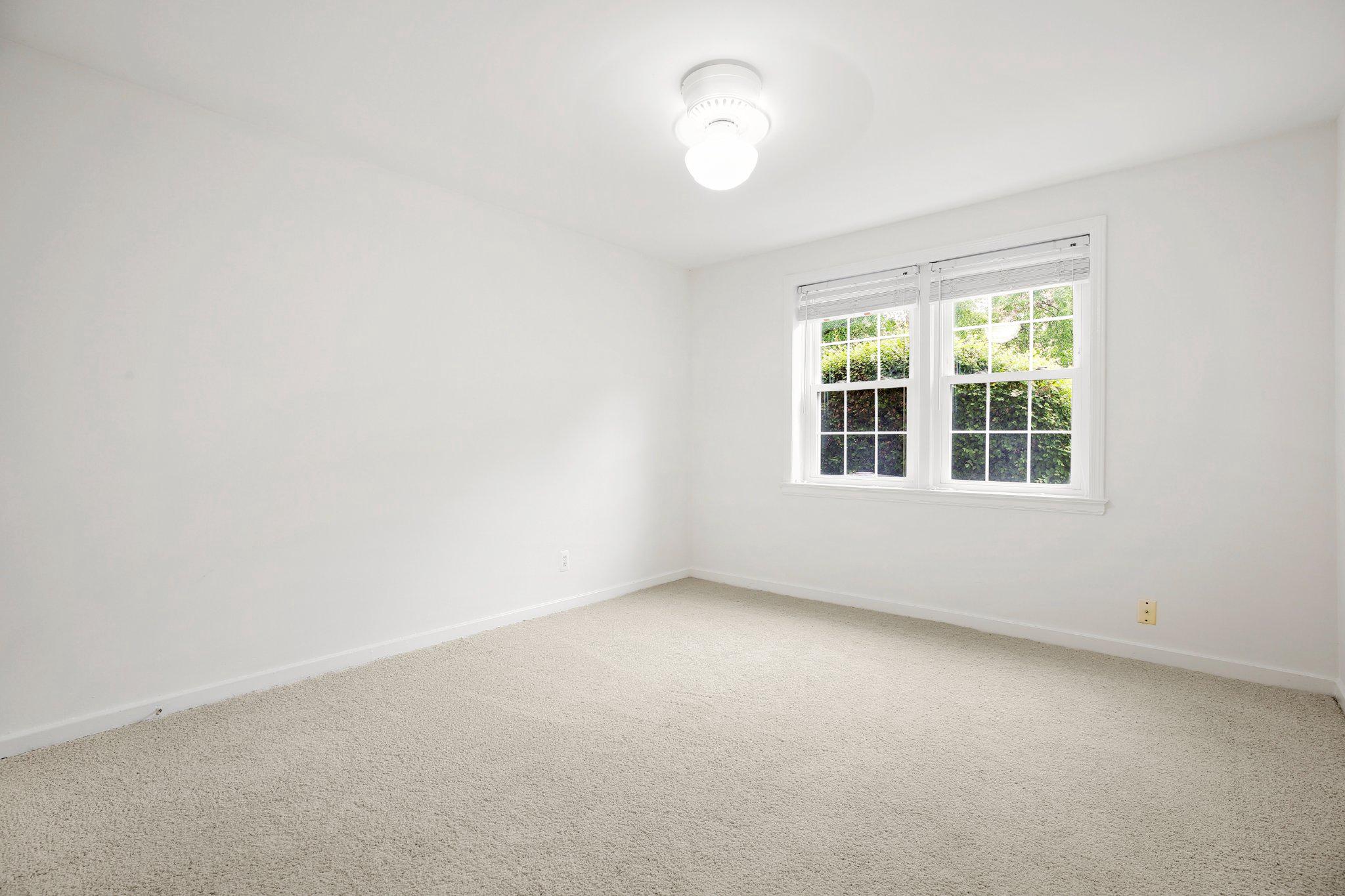 2202 Colston Drive, Unit 102 Silver Spring, MD 20910 - Photo 16 of 38 an empty room with a window