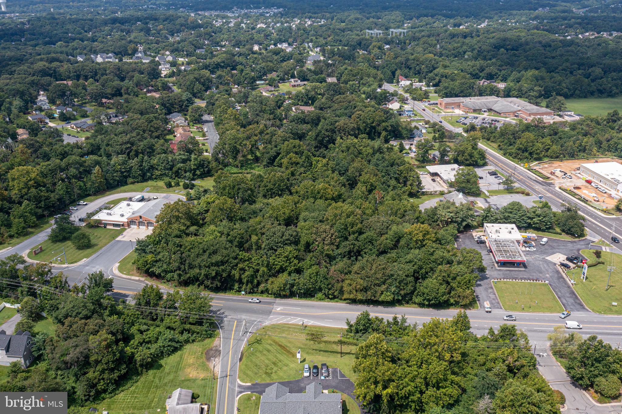 7860 Telegraph Road Severn, MD 21144 - Photo 5 of 14 an aerial view of residential houses with outdoor space and trees