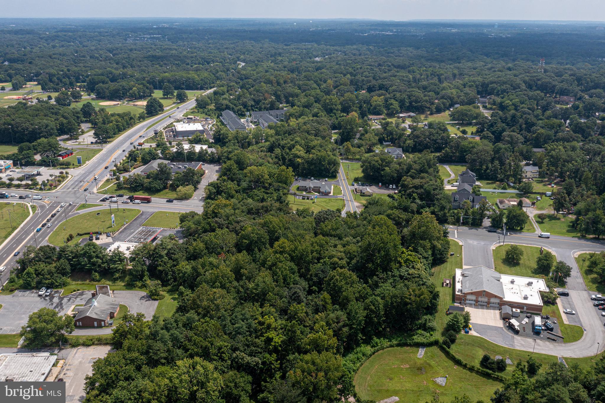 7860 Telegraph Road Severn, MD 21144 - Photo 8 of 14 an aerial view of a house with a yard